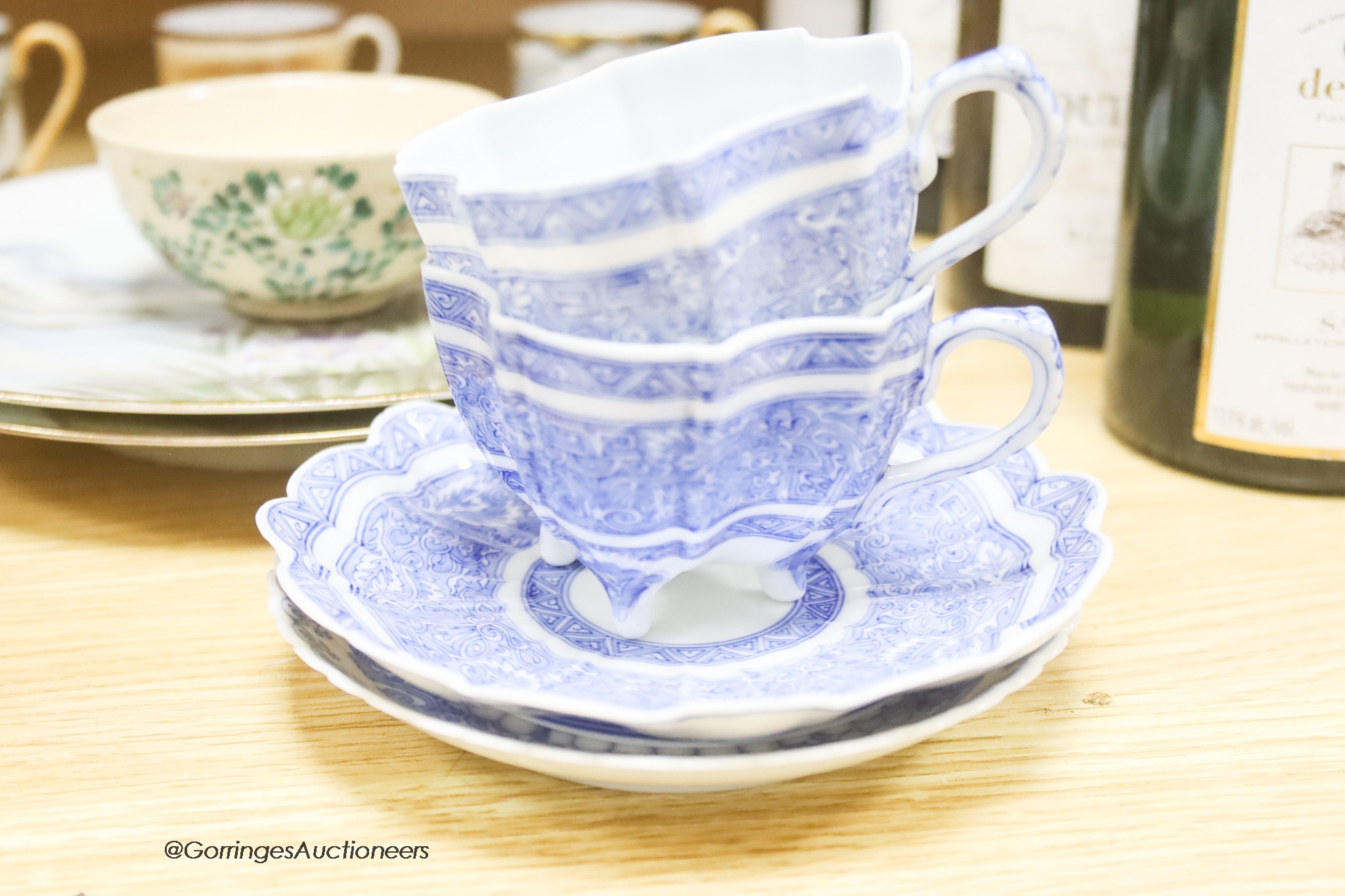 A group of various Japanese Meiji period cup and saucers